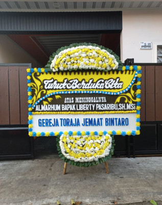 Papan Bunga Duka di Girisuko